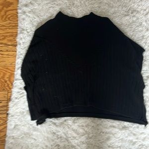 Black poncho sweater